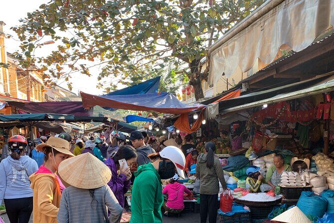 Coconut Basket boat, City tour, Boat ride, Night market from DN - Lanters on the Hoai River and a Rooftop Sunset Drink