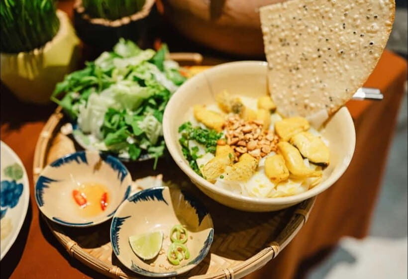 Da Nang: Michelin-Selected Street Food Tour with Local Guide - Mì Quảng 1A: turmeric noodles, pork and shrimp, and crispy rice