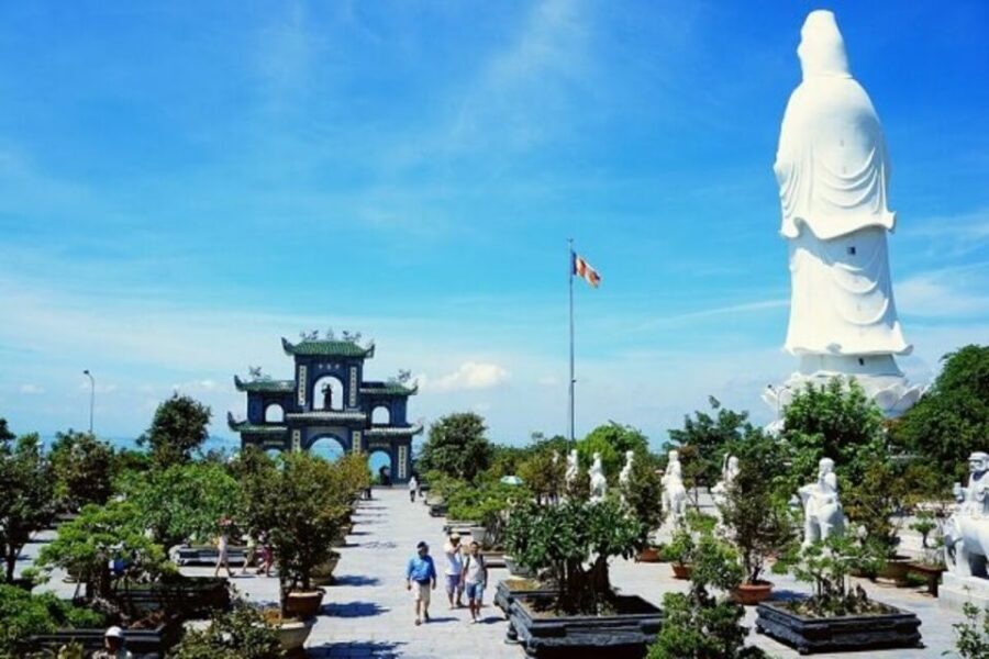 Da Nang: Private City Tour by Scooter with Ao dai Lady Rider - Da Nang Cathedral: Gothic details and the gray chicken roof statue