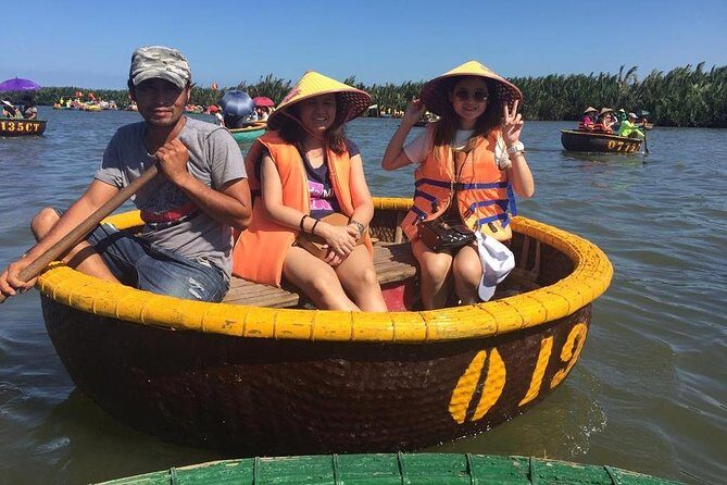 DaNang City & Coconut Jungle-Basket Boat-Hoi An city-Night Market - Sampan cruise at early night time: Hoi An from the waterline