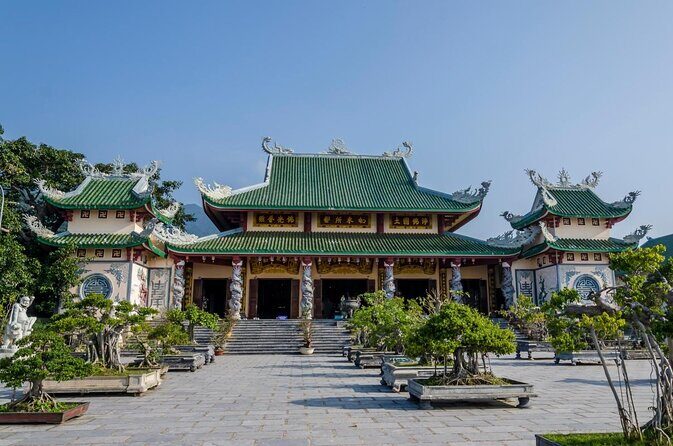 Danang Food City Tour by Motorbike - Private Tour - Han River at night: where the city glows and you get oriented fast