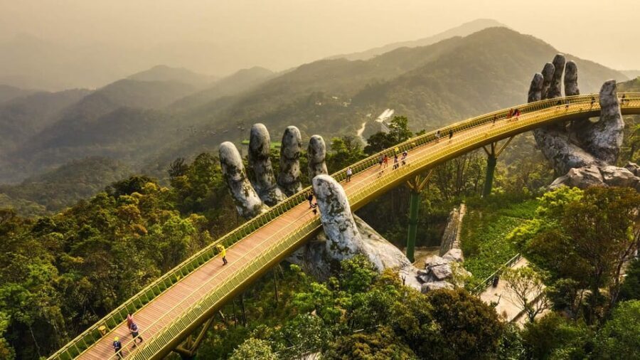 From Da Nang: Ba Na Hills Golden Bridge Private Tour & Lunch - French Village at 11:00 AM: stone church, street festival mood, and a real lunch break