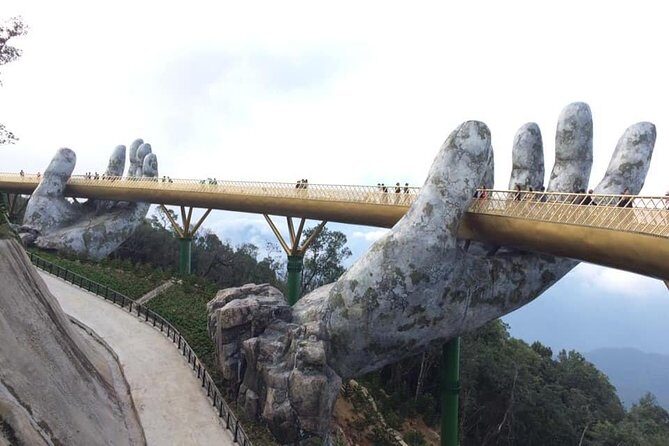 Golden Bridge-Marble Mountain-Hoi An City -Boat Ride-Night Market - The French Village, Debay Wine Cellar, and Linh Ung Pagoda